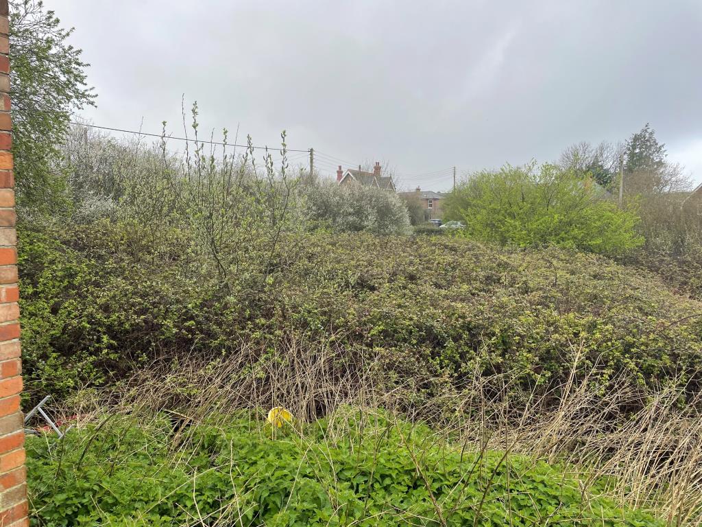 Lot: 18 - 13 PARCELS OF LAND WITH POTENTIAL IN STRATEGIC LOCATION - view of land towards Mill Road from building